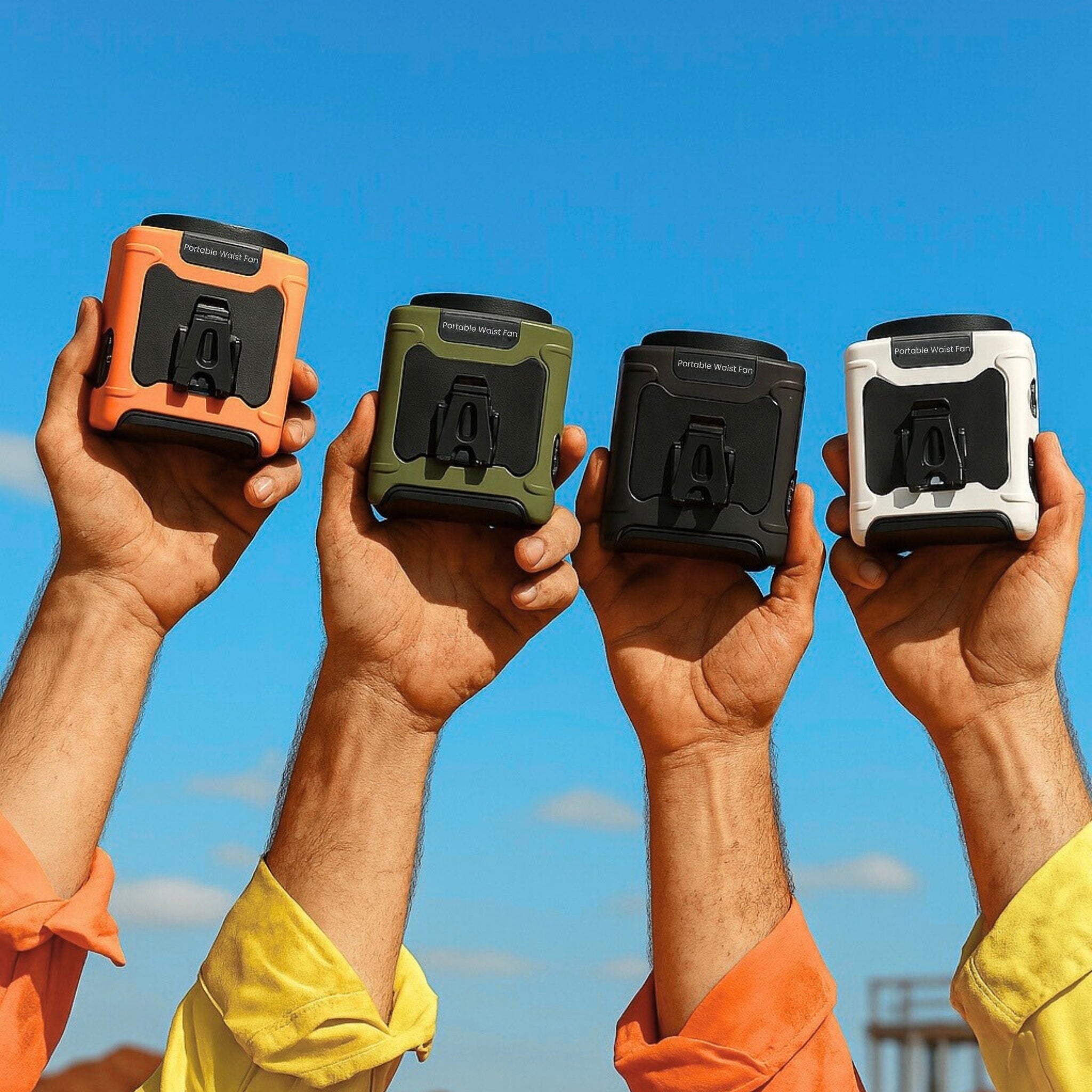 Tradies holding each colour of the portable waist fan from tradecool